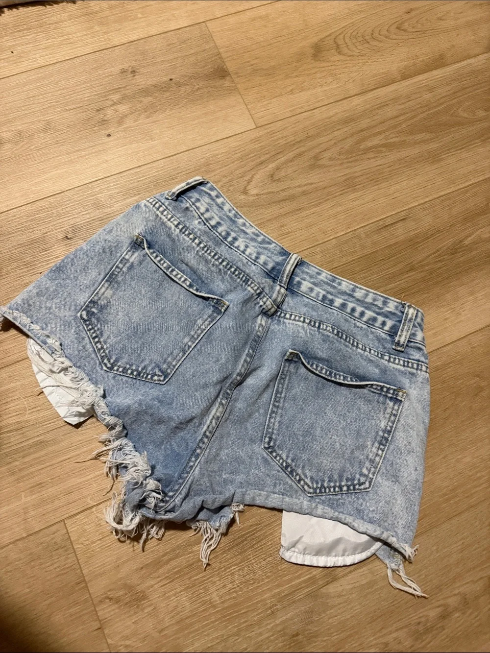 Light Wash Distressed Denim Shorts - Women